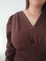 Blusa de escote en V y cintura elástica