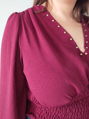 Blusa de escote en V y cintura elástica
